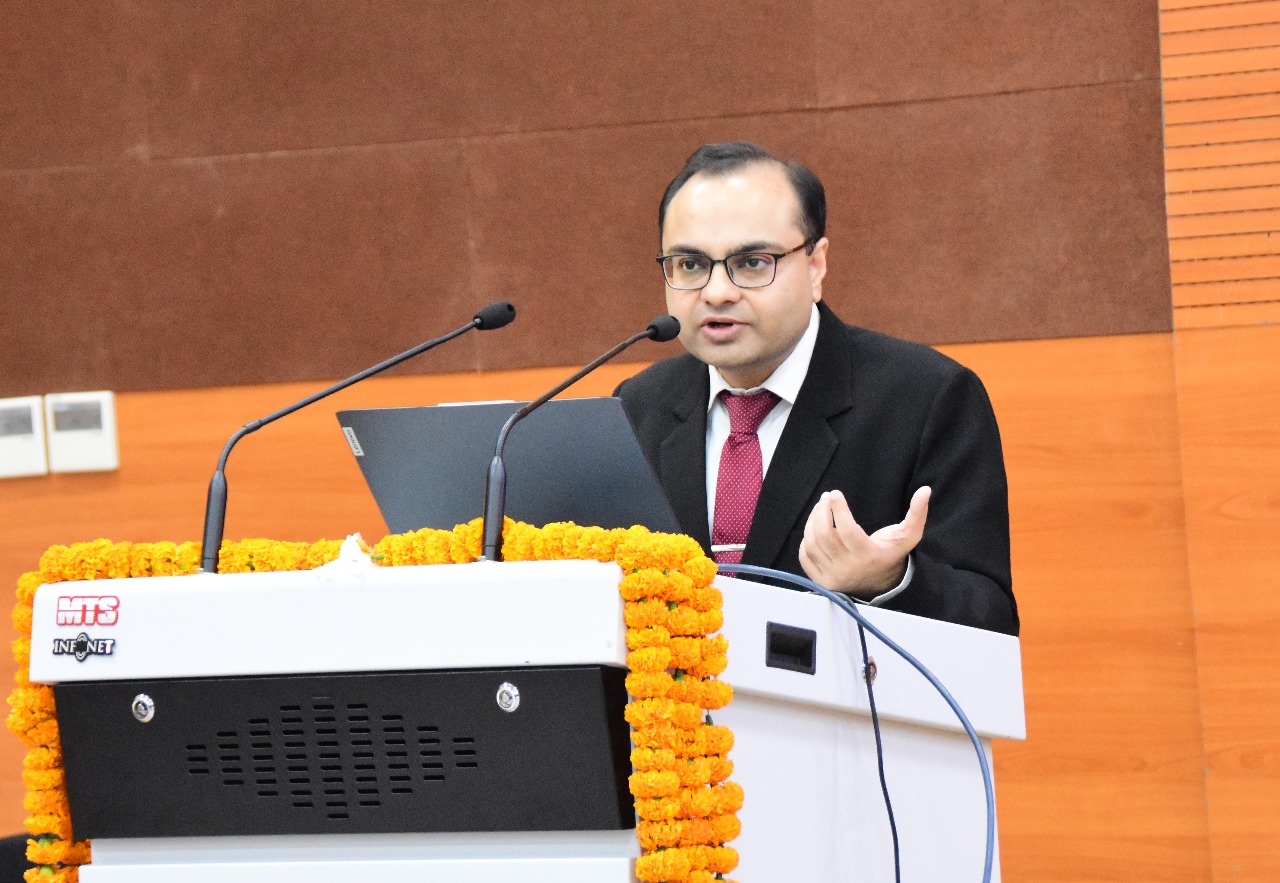 Lecturing at the university.